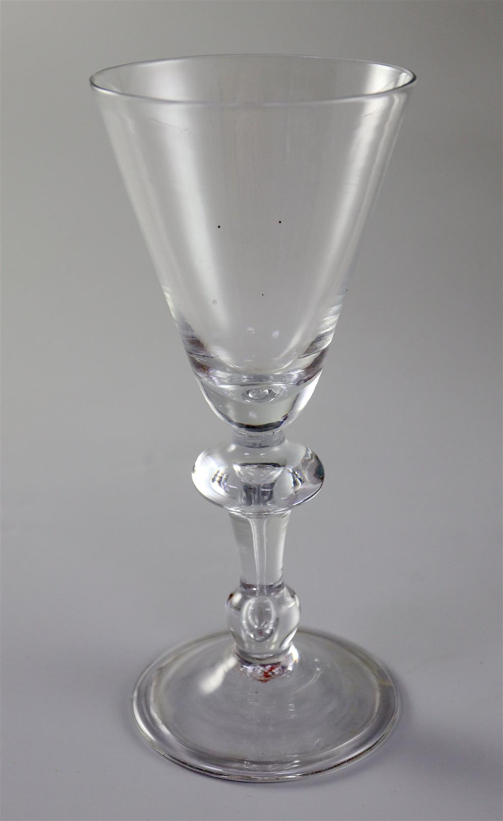 An English or Dutch light baluster wine glass, c.1740, 17.2cm high